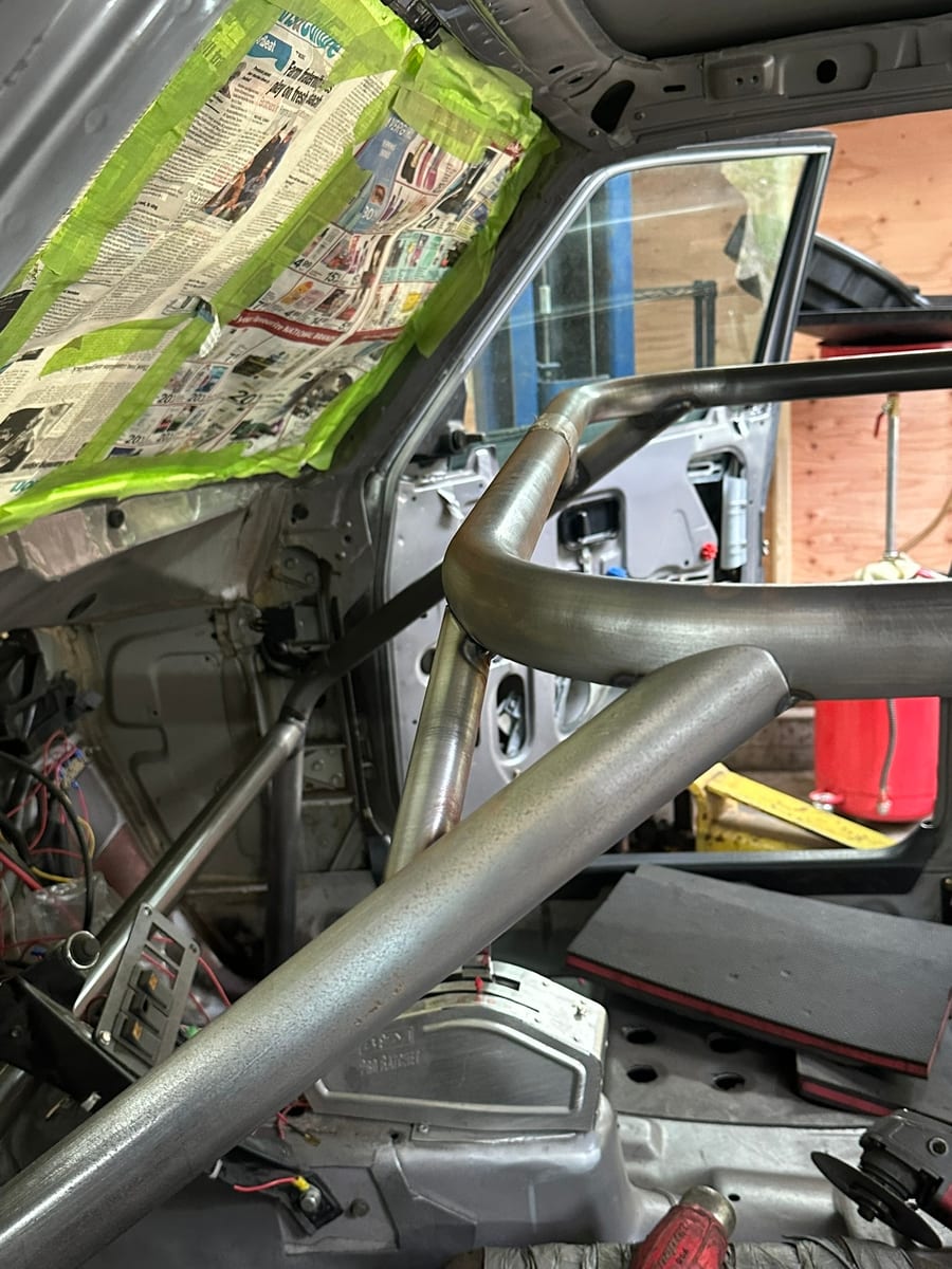 Roll cage tubing taped and prepped for welding